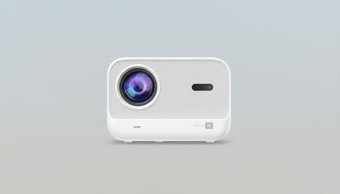 A white portable projector with a large lens and SOUND BY JBL branding, set against a professional flat gray background with a subtle gradient.
