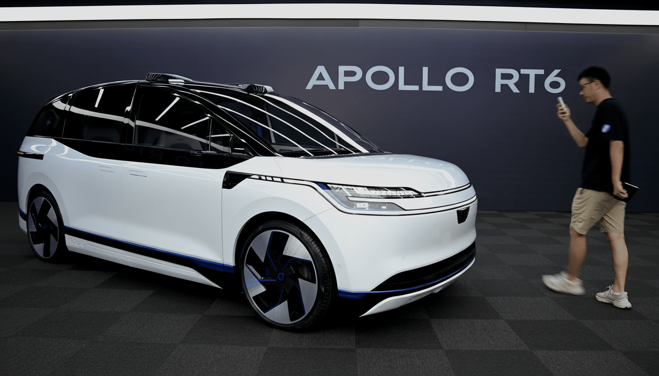 A white Apollo RT6 autonomous vehicle is displayed in a showroom with a man taking a photo of it.