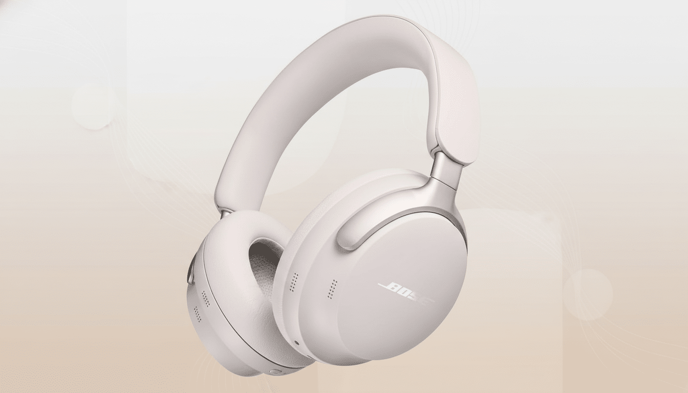 A pair of light pink Bose noise-cancelling headphones on a soft, gradient background with subtle wave patterns.