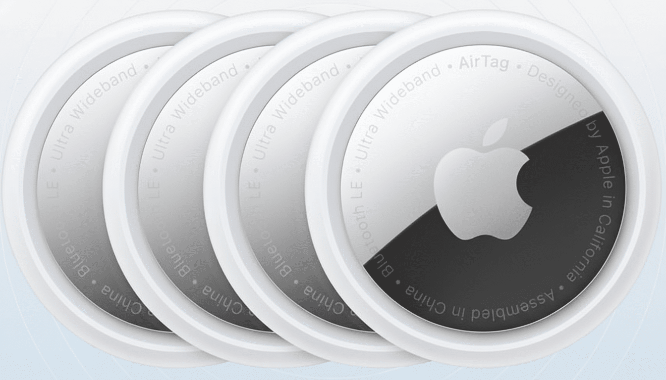 Four Apple AirTags are shown in a row, with the front-most AirTag displaying the Apple logo and text details. The background is a soft, light blue gradient with subtle patterns.