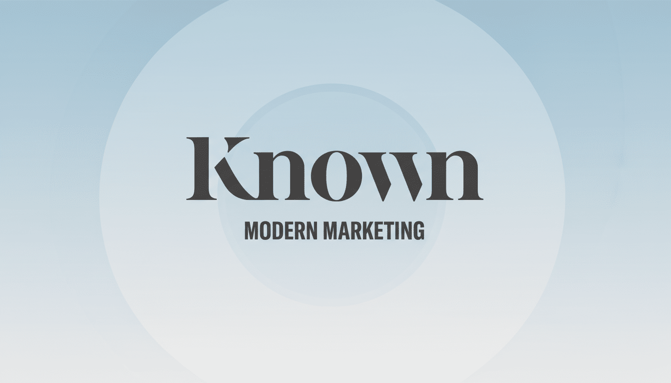 The Known Modern Marketing logo is presented on a professional 16:9 aspect ratio background with a soft blue and white gradient and subtle circular patterns.