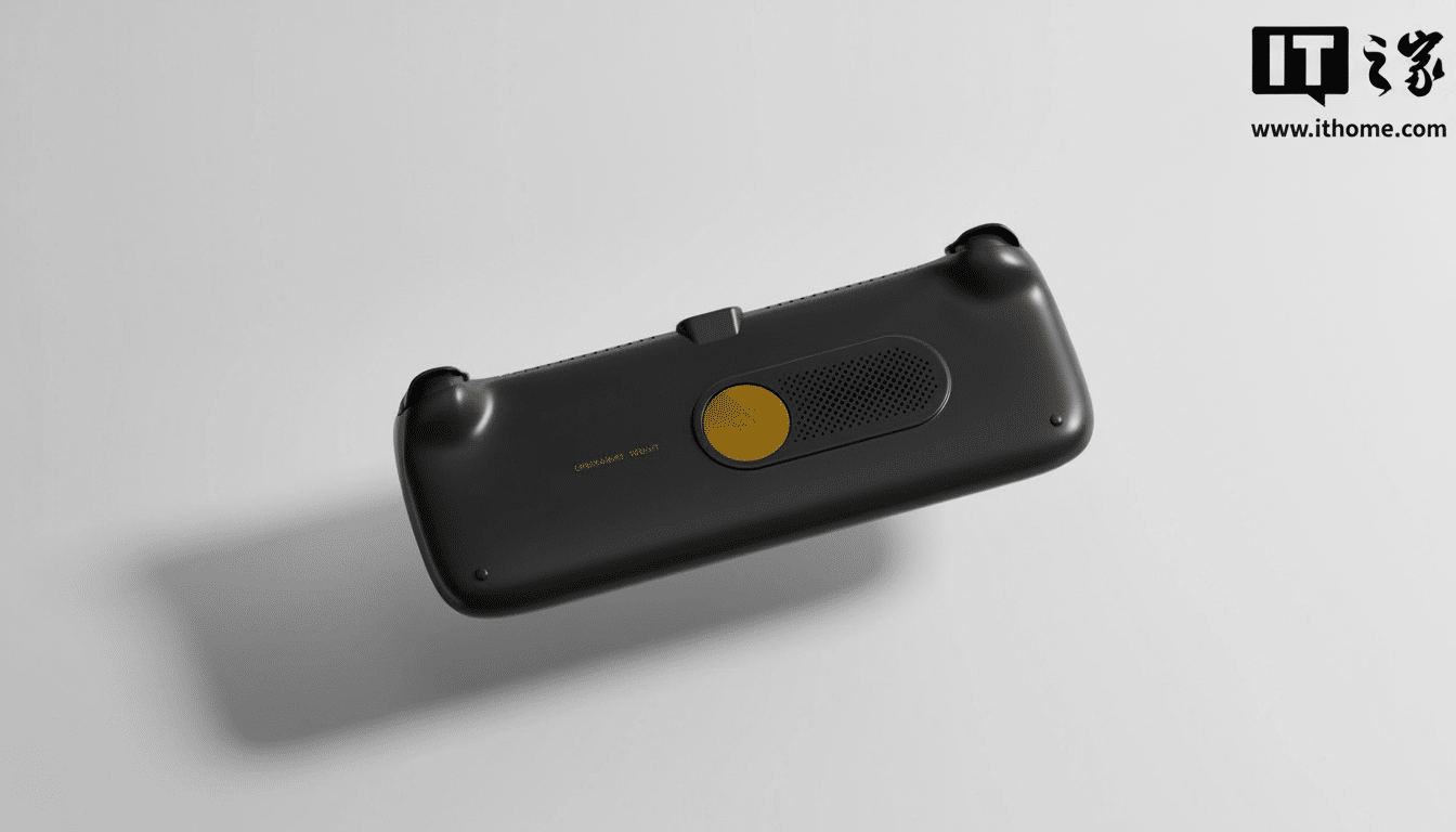 A black handheld gaming device with a gold button and speaker grille, presented on a clean, professional background.