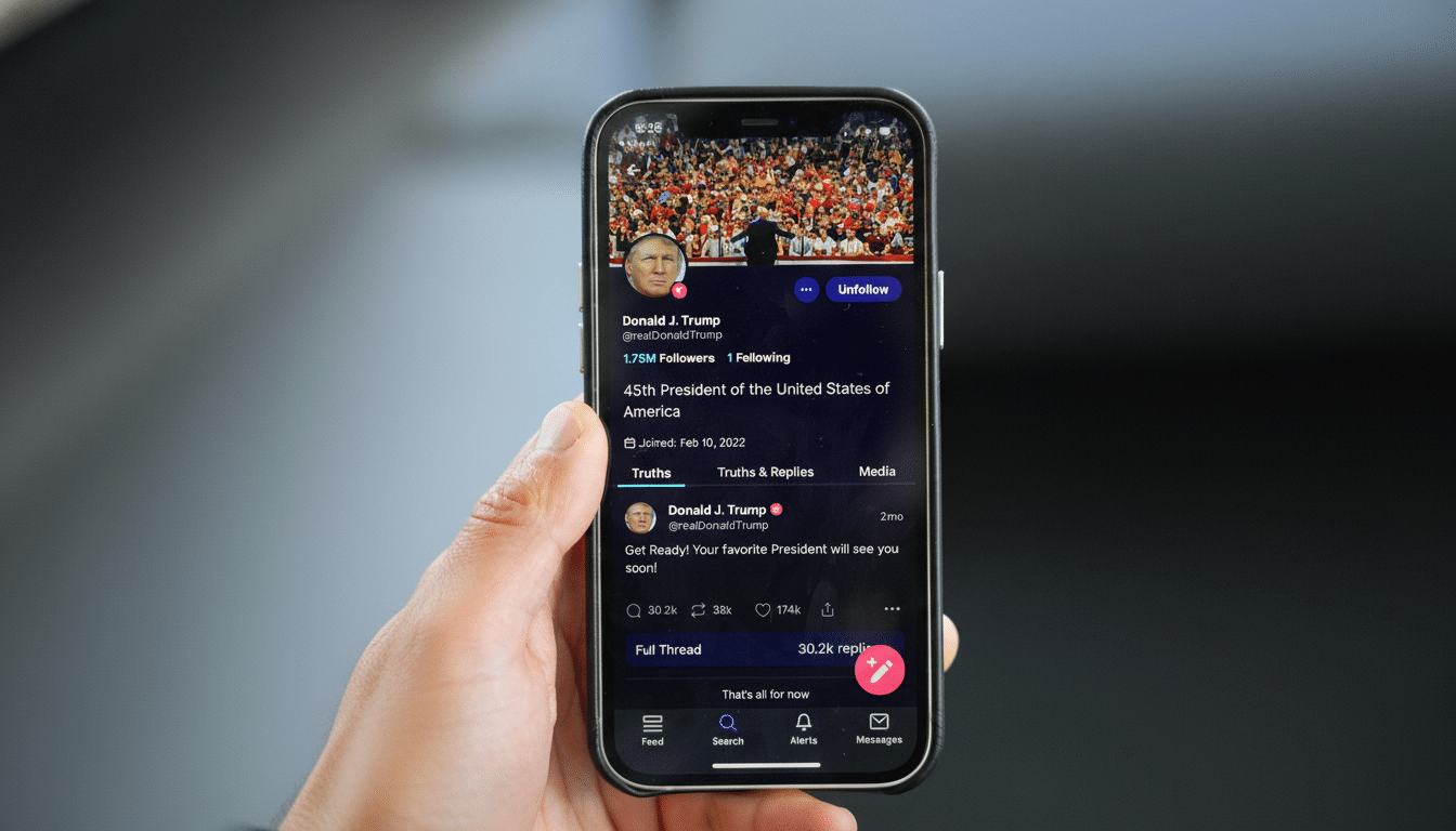A hand holding a smartphone displaying Donald Trumps profile on the Truth Social app, resized to a 16:9 aspect ratio with a blurred background.