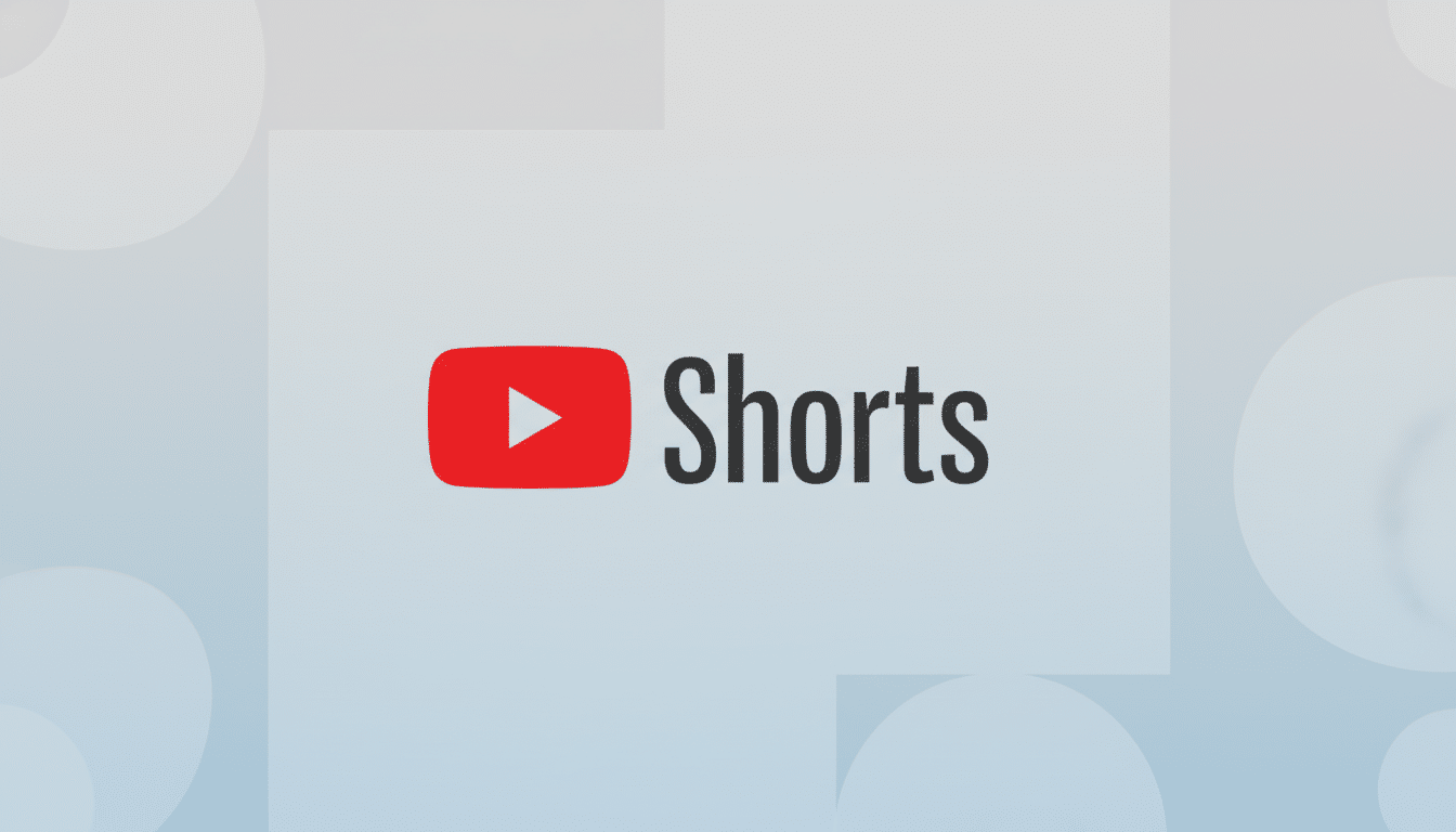 The YouTube Shorts logo, featuring a red play button icon next to the word Shorts in black text, centered on a light gray background with subtle, soft gray geometric patterns.