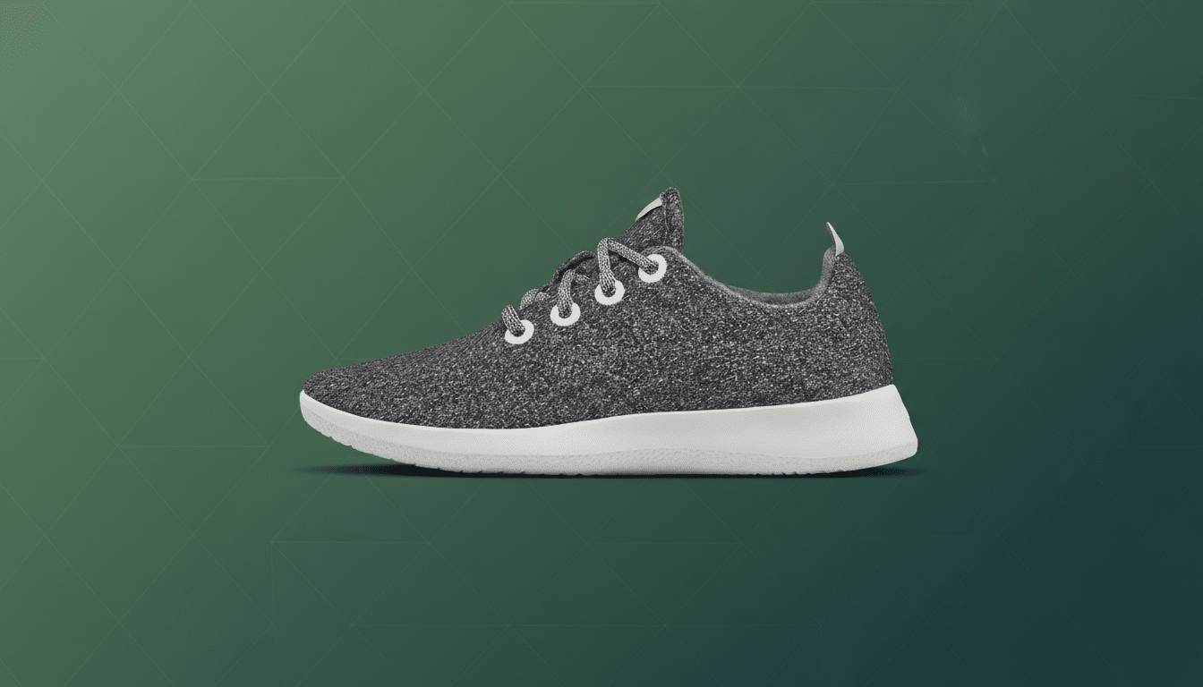 A single dark gray sneaker with white laces and a white sole, presented on a professional dark green background with subtle geometric patterns.