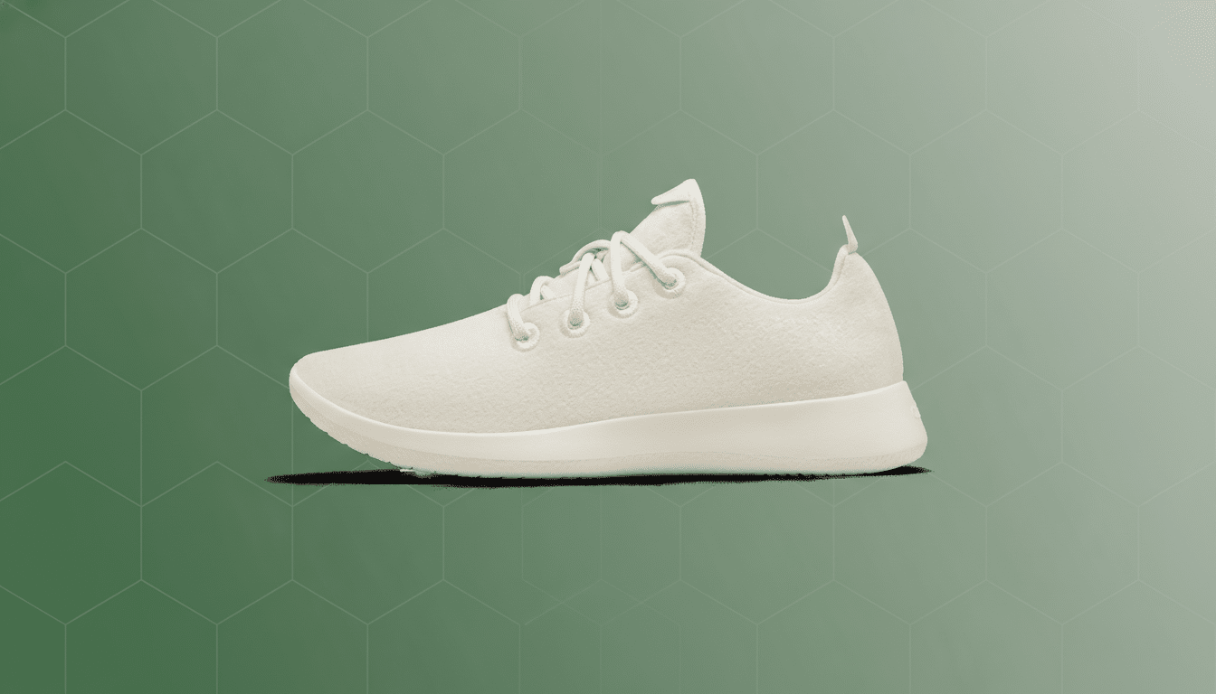 A single cream-colored sneaker with white laces, presented on a professional green background with a subtle hexagonal pattern.