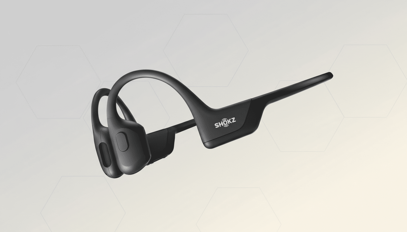 A pair of black Shokz bone conduction headphones on a professional flat design background with soft patterns.