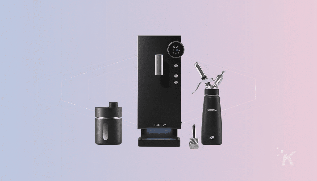 A professional image of a black XBREW coffee machine, a black XBREW n2 dispenser, and a black mug, all arranged on a soft gradient background with subtle geometric patterns.