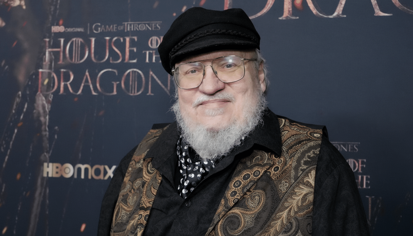 George R.R. Martin smiling at a premiere event for House of the Dragon.