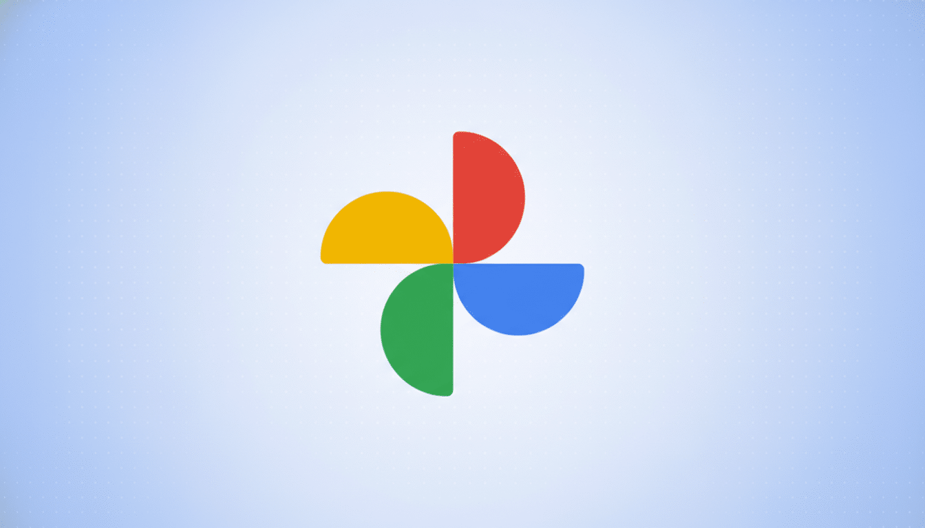 The Google Photos logo, consisting of four colorful, semicircular shapes (yellow, red, blue, and green) arranged in a pinwheel pattern, centered on a light blue background with a subtle dotted pattern.