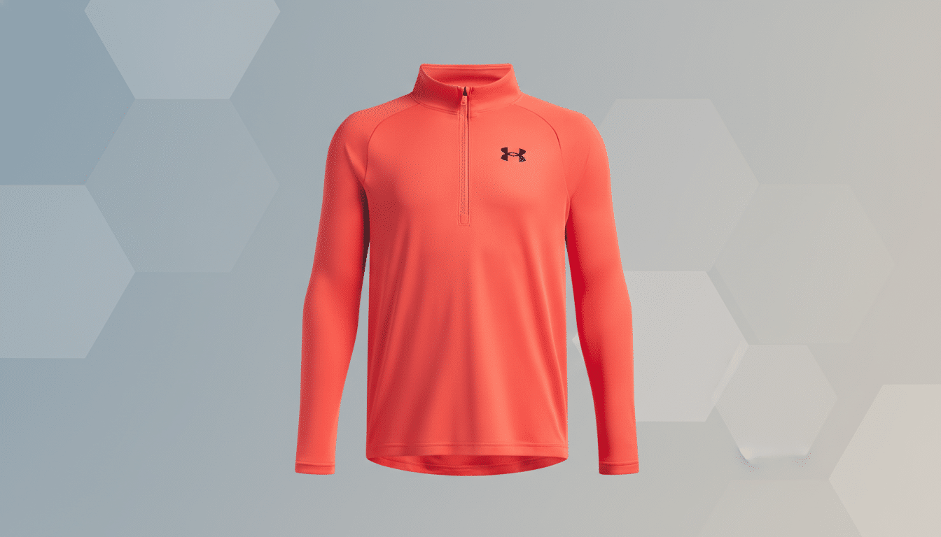 A vibrant orange Under Armour long-sleeve quarter-zip shirt with a black logo on the chest, presented on a professional flat design background with soft gray and white hexagonal patterns and gradients.