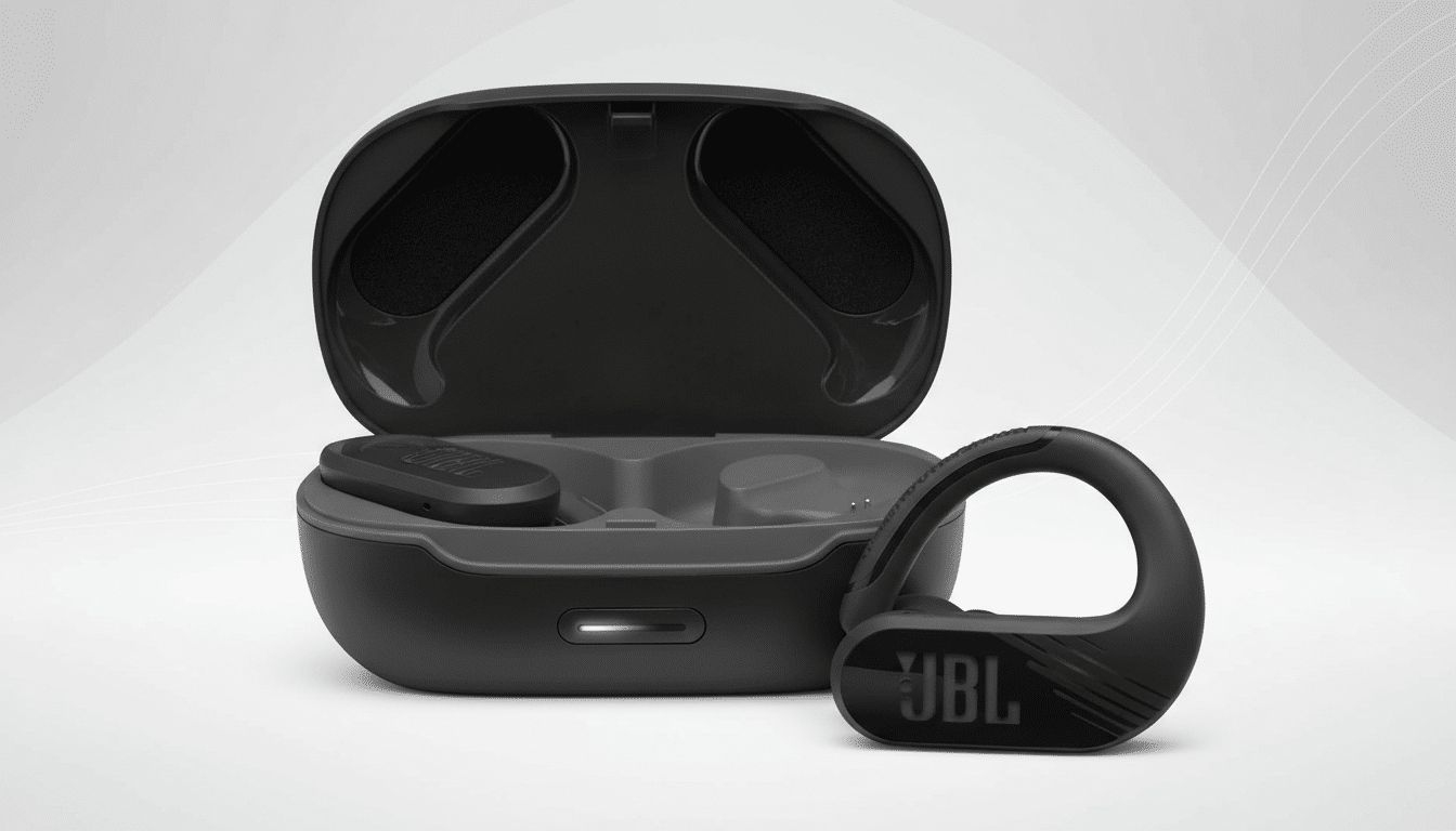 A pair of black JBL wireless earbuds with an ear hook design, next to their open charging case, presented on a professional flat gray background with subtle white wave patterns.