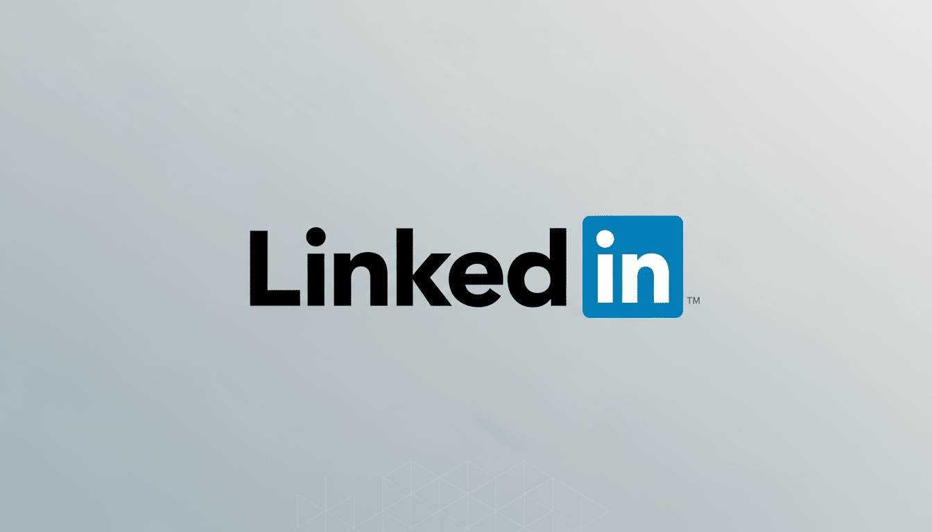 The LinkedIn logo, featuring the word Linked in black and in in white within a blue square, centered on a professional light gray background with a subtle geometric pattern.