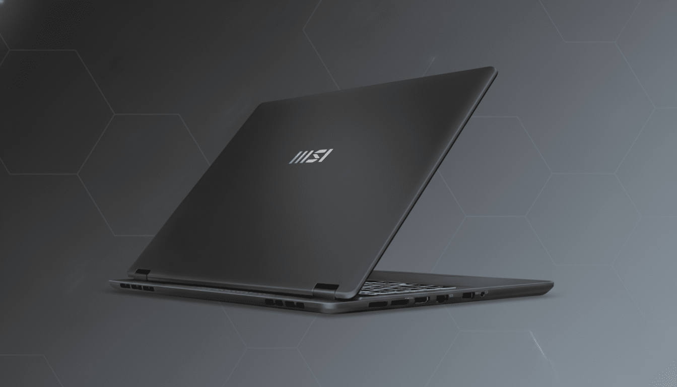 A dark gray MSI laptop is angled on a professional dark gray background with subtle hexagonal patterns.