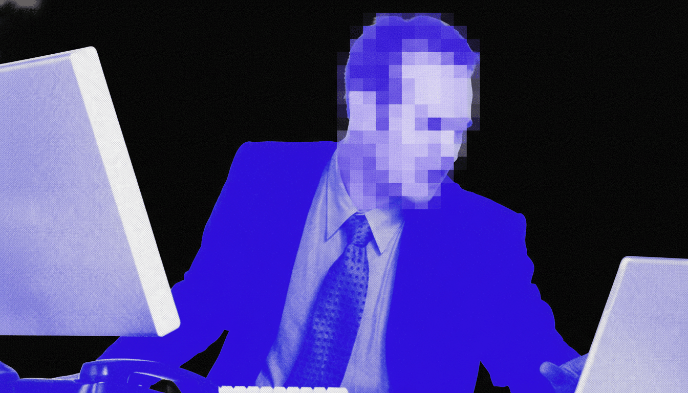 A man in a suit with a pixelated face, working between two computer monitors, rendered in blue and black with a grainy texture.
