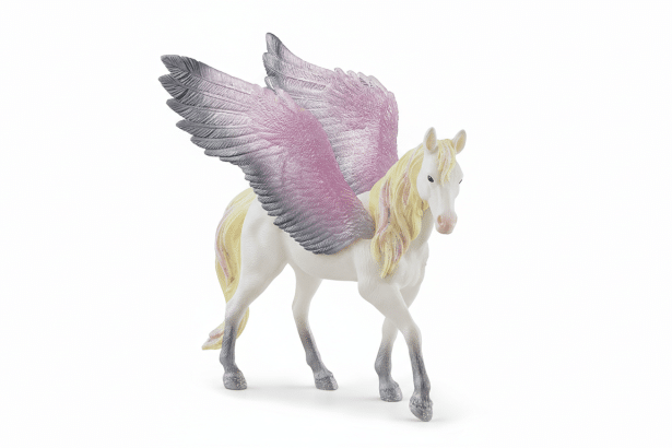 A white toy Pegasus with pink and grey wings, a blonde mane, and glittery hooves stands on a white background.