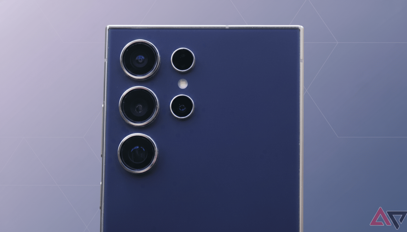 A close-up, professional shot of the back of a dark blue smartphone, showcasing its multiple camera lenses arranged vertically, against a soft, gradient background with subtle geometric patterns.