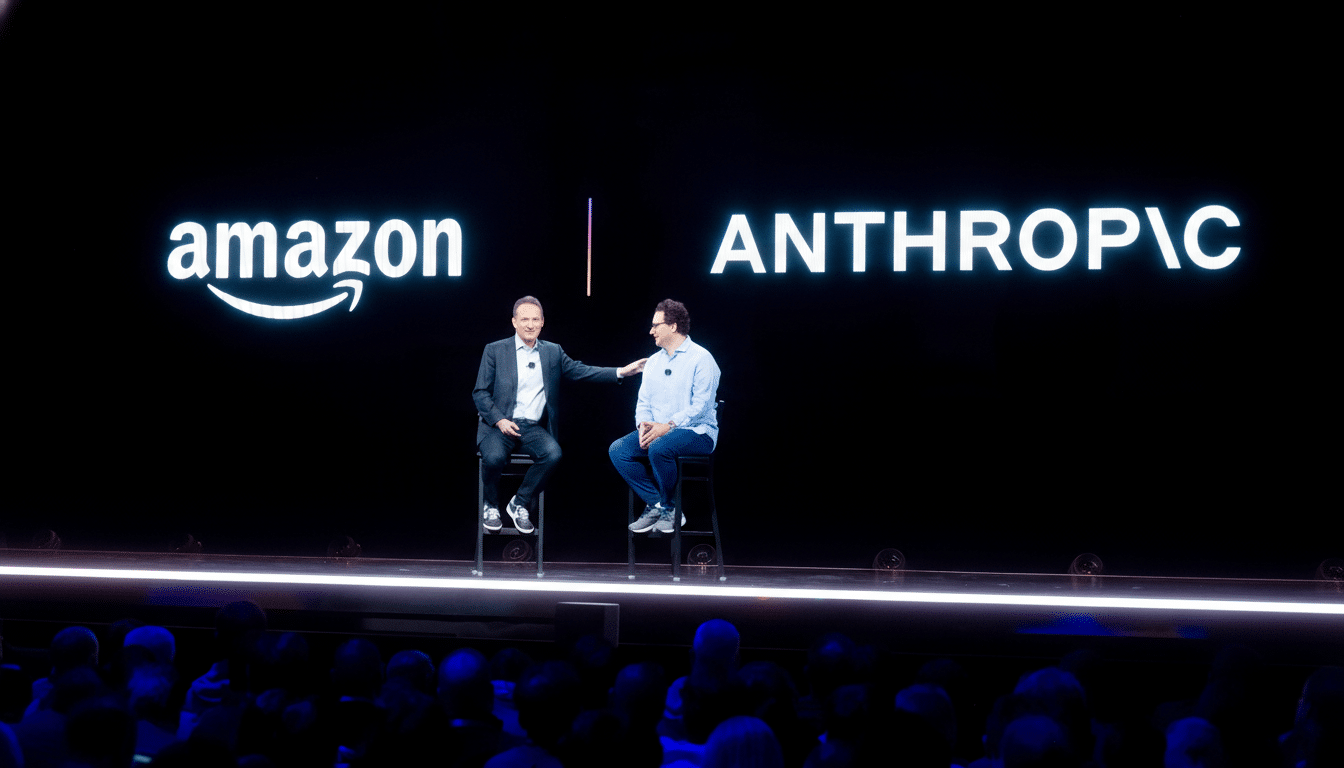 Two men sitting on stools on a stage with amazon and ANTHROPIC logos displayed on a large screen behind them.