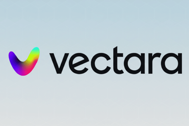 The Vectara logo, featuring a colorful, gradient checkmark icon to the left of the black text vectara, presented on a light blue background with a subtle hexagonal pattern.