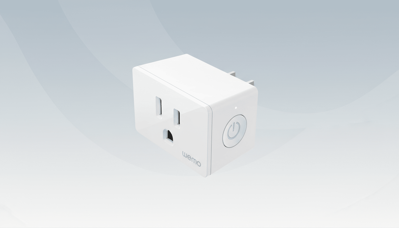 A white WeMo smart plug with a power button on the side, set against a professional flat design background with soft gray gradients.