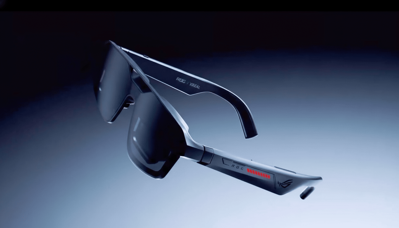 A pair of sleek, dark augmented reality glasses with red accents, featuring the ROG XREAL logo, floating against a gradient background.