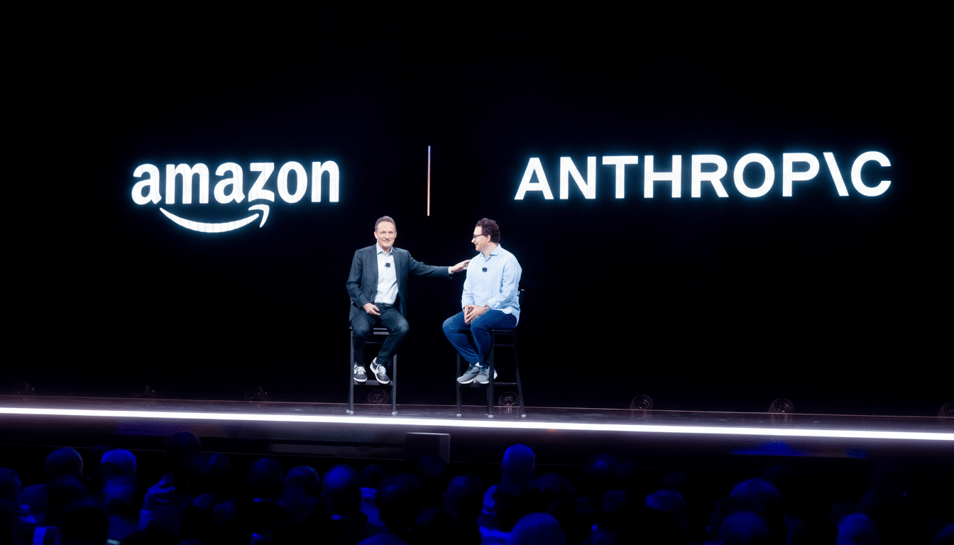 Two men sitting on stools on a stage with amazon and ANTHROPIC logos displayed on a large screen behind them.