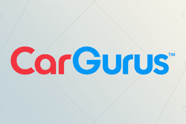 The CarGurus logo, featuring Car in red and Gurus in blue with a small blue TM symbol, centered on a professional light gray background with subtle geometric patterns.