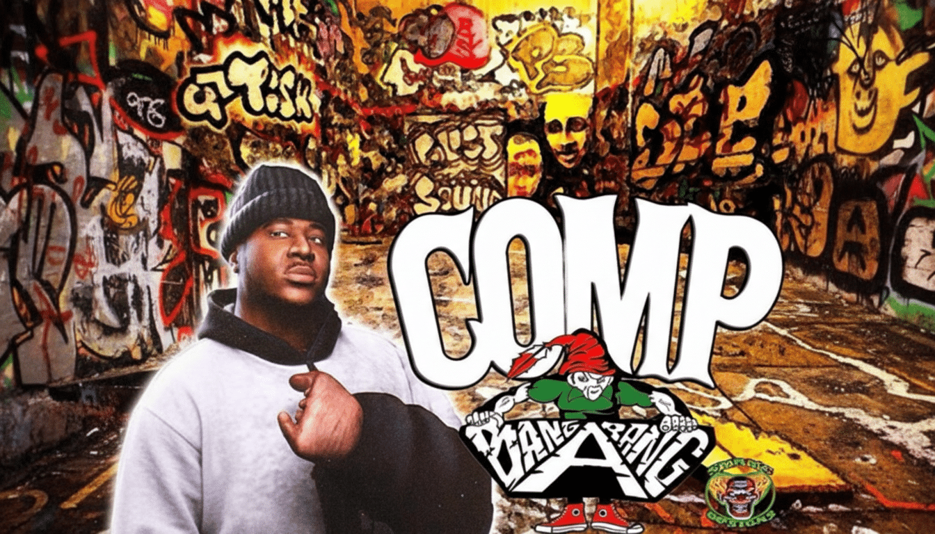 A man in a black beanie and white hoodie stands in front of a graffiti-covered wall, with the word COMP and a GANG BANG logo featuring a gnome in a red hat.