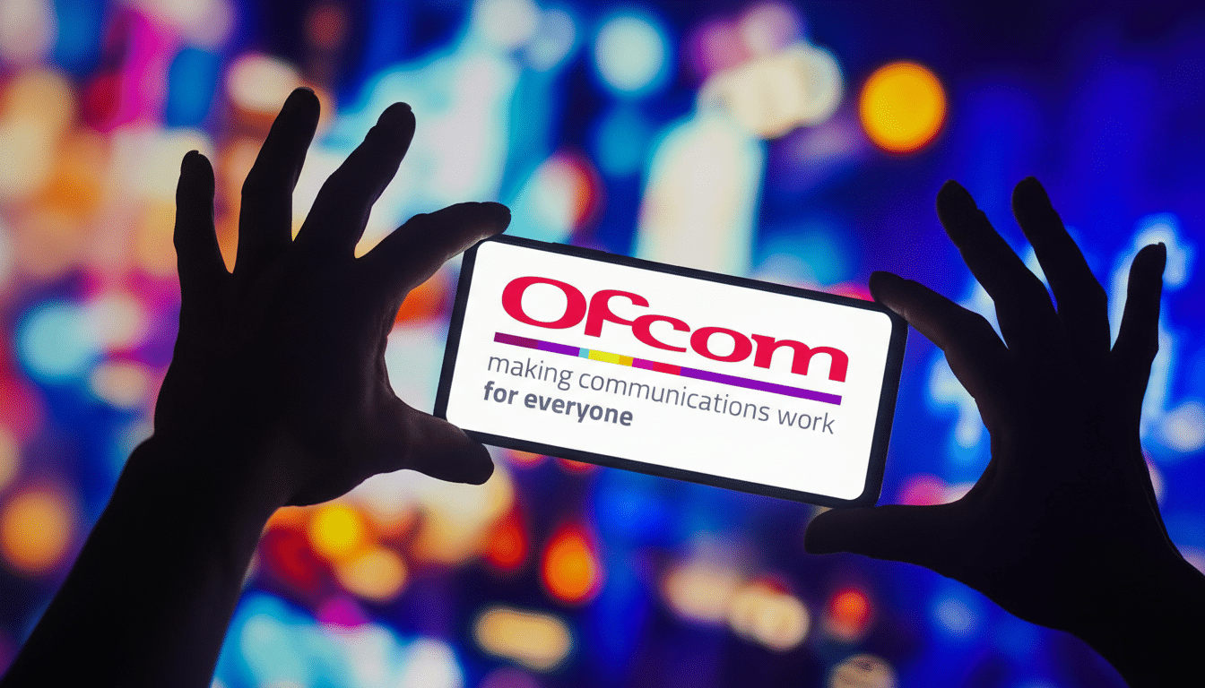 A pair of silhouetted hands holding a smartphone displaying the Ofcom logo and slogan making communications work for everyone against a blurred background of colorful lights.