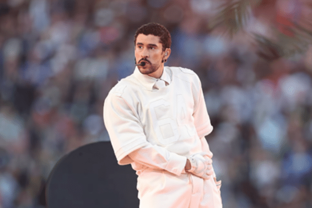 Bad Bunny performing on stage, resized to a 16:9 aspect ratio.