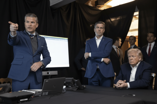 Defense Secretary Pete Hegseth pointing, with CIA Director John Ratcliffe and President Donald Trump in the background.