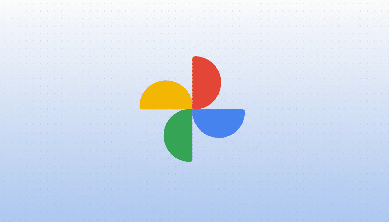 The Google Photos logo, consisting of four colorful, semicircular shapes arranged in a pinwheel pattern, centered on a light blue gradient background with a subtle dotted pattern.