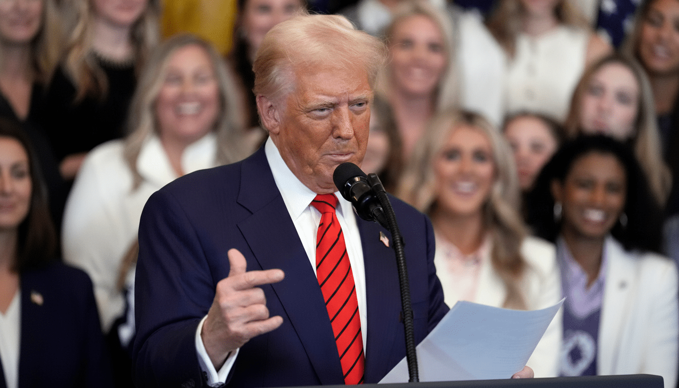 Donald Trump speaking at a podium with a crowd of women in the background.