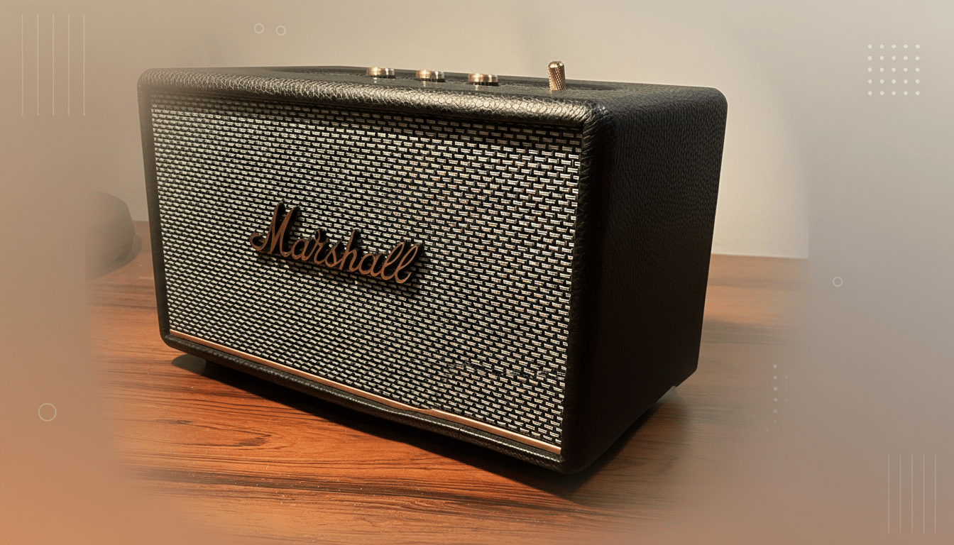 A black Marshall speaker with a white and black patterned grille and gold accents, sitting on a wooden surface, with a professionally enhanced background featuring soft gradients and subtle geometric patterns.