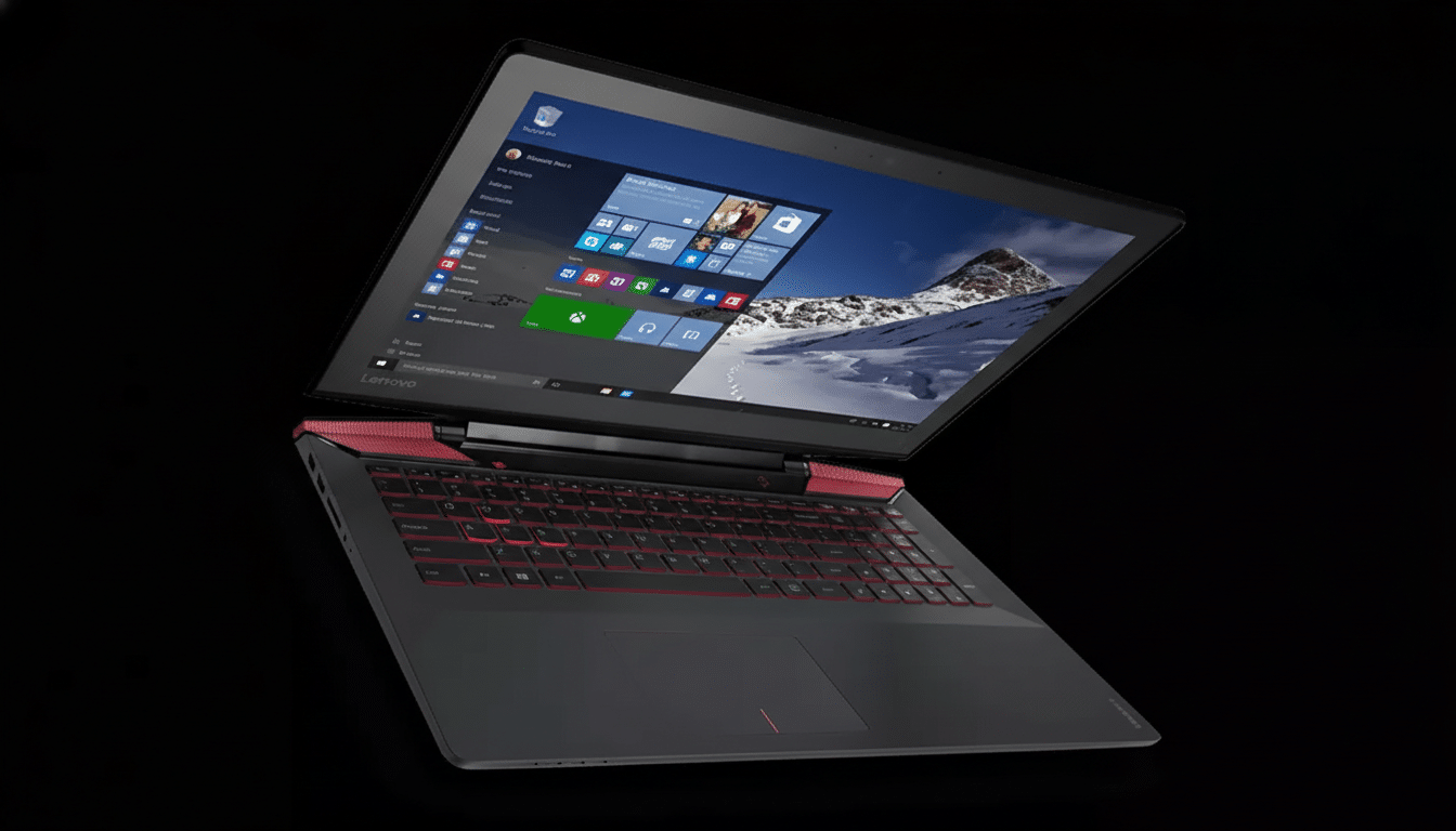 A black and red Lenovo gaming laptop with a mountain landscape displayed on its screen, set against a dark background.