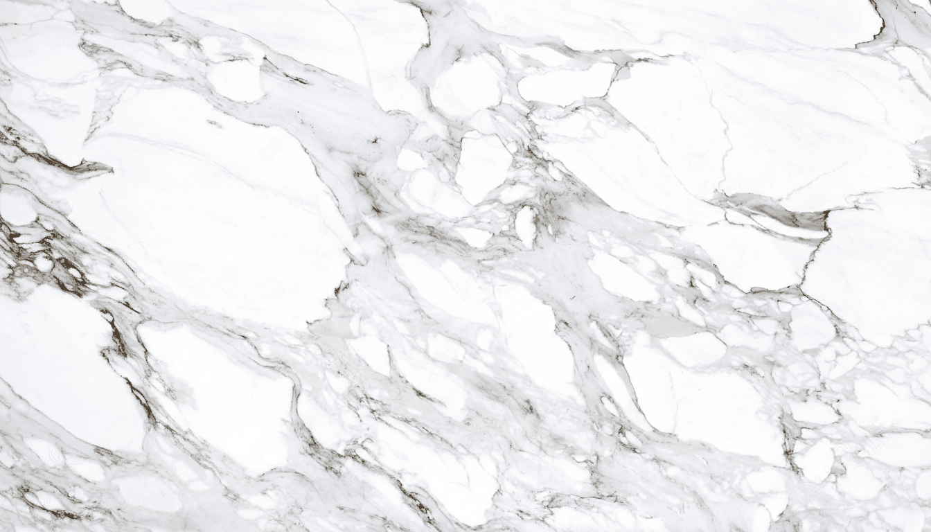A close-up of a white marble surface with intricate gray and black veining, resized to a 16:9 aspect ratio.
