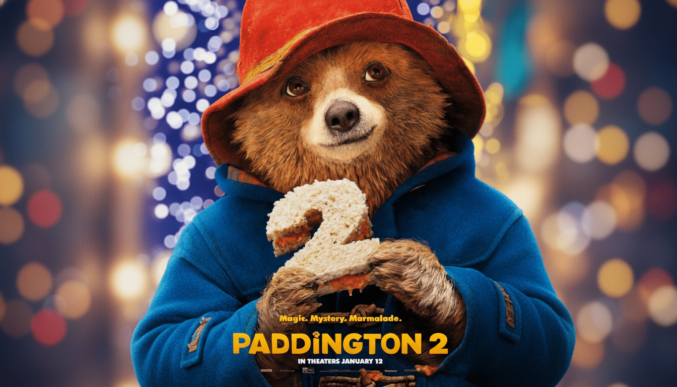A movie poster for Paddington 2, featuring Paddington Bear in his blue coat and red hat, holding a sandwich shaped like the number 2.
