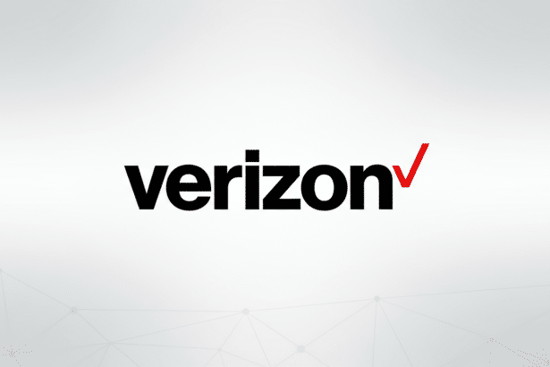 The Verizon logo, featuring the word verizon in black lowercase letters with a red checkmark at the end, centered on a professional light gray background with subtle geometric patterns.