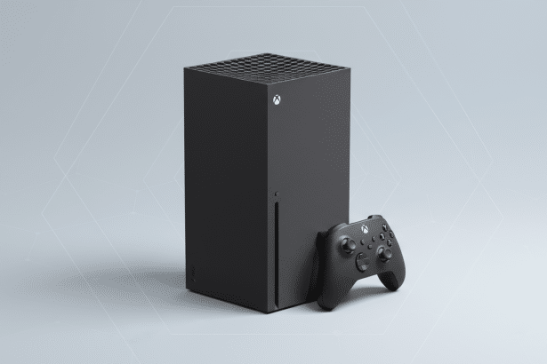 A black Xbox Series X console stands upright next to a black Xbox wireless controller, set against a professional light gray background with subtle geometric patterns.