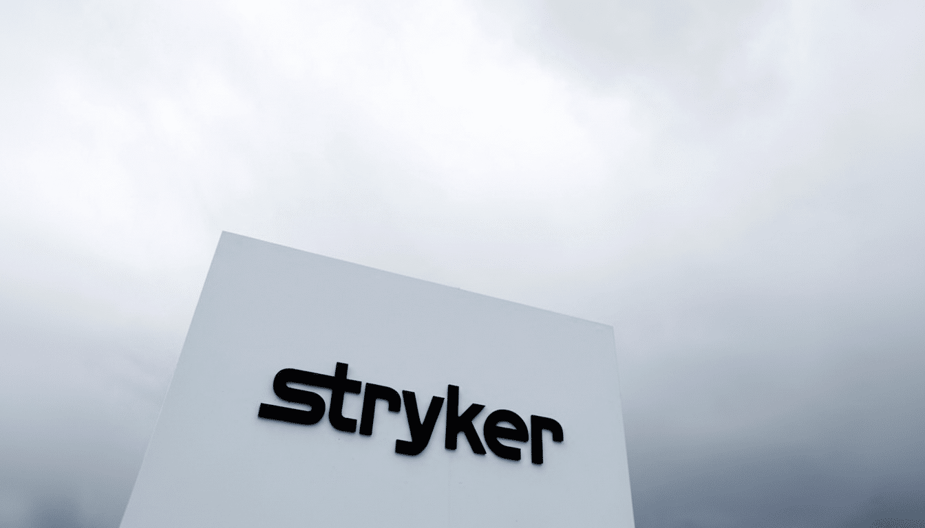 The Stryker logo in black text on a white sign, set against a cloudy sky, resized to a 16:9 aspect ratio.