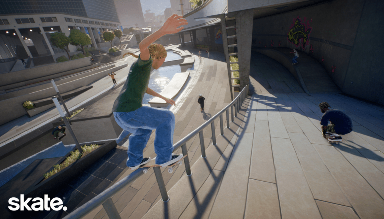 A person with blonde hair in a green shirt and blue jeans grinds a skateboard on a metal rail in an urban skate park, with other skaters and buildings in the background.