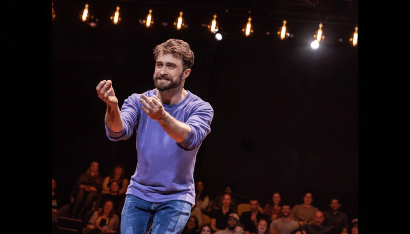 Daniel Radcliffe on stage, resized to a 16:9 aspect ratio, maintaining the original background.