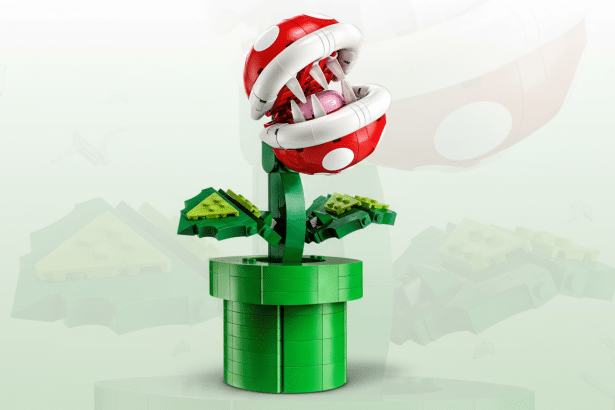A LEGO Piranha Plant set, featuring the iconic red and white head with sharp teeth, a green stem, and green leaves, all emerging from a green pipe base. The background is a soft gradient with subtle patterns.