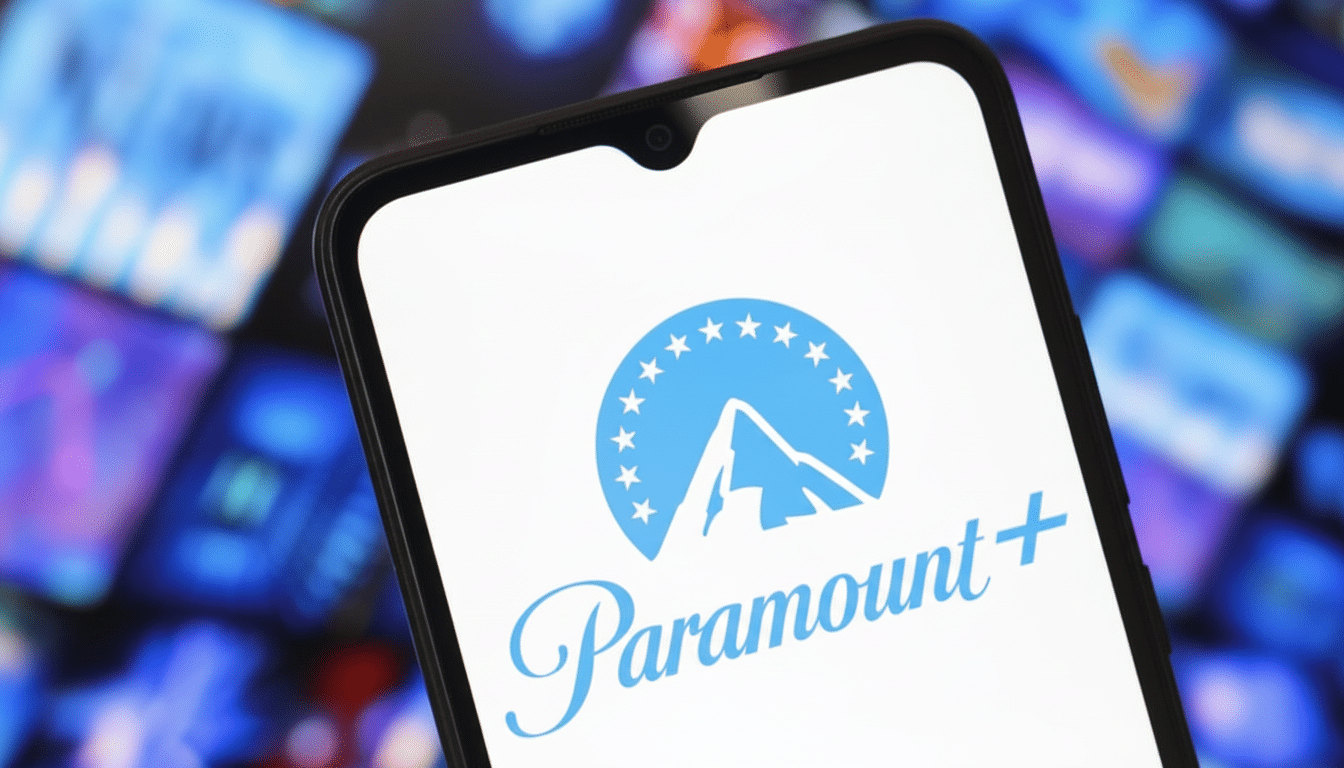 A smartphone displaying the Paramount+ logo on its screen, with a blurred background of various media content.