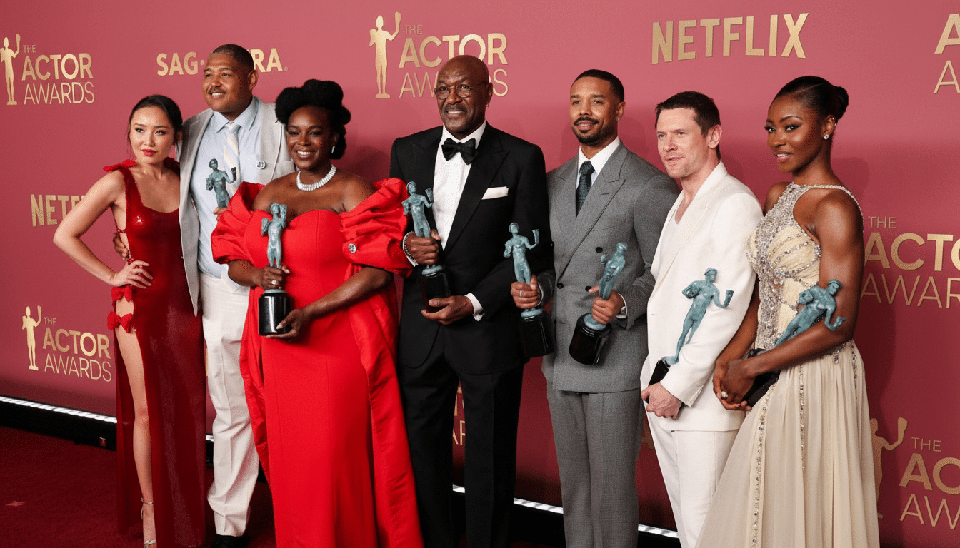 A group of actors posing with their awards at the SAG Awards.