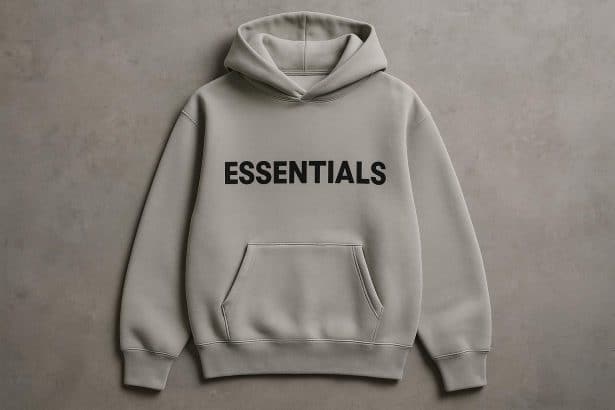 Gray Essentials hoodie displayed on a minimalist background highlighting comfort and streetwear style