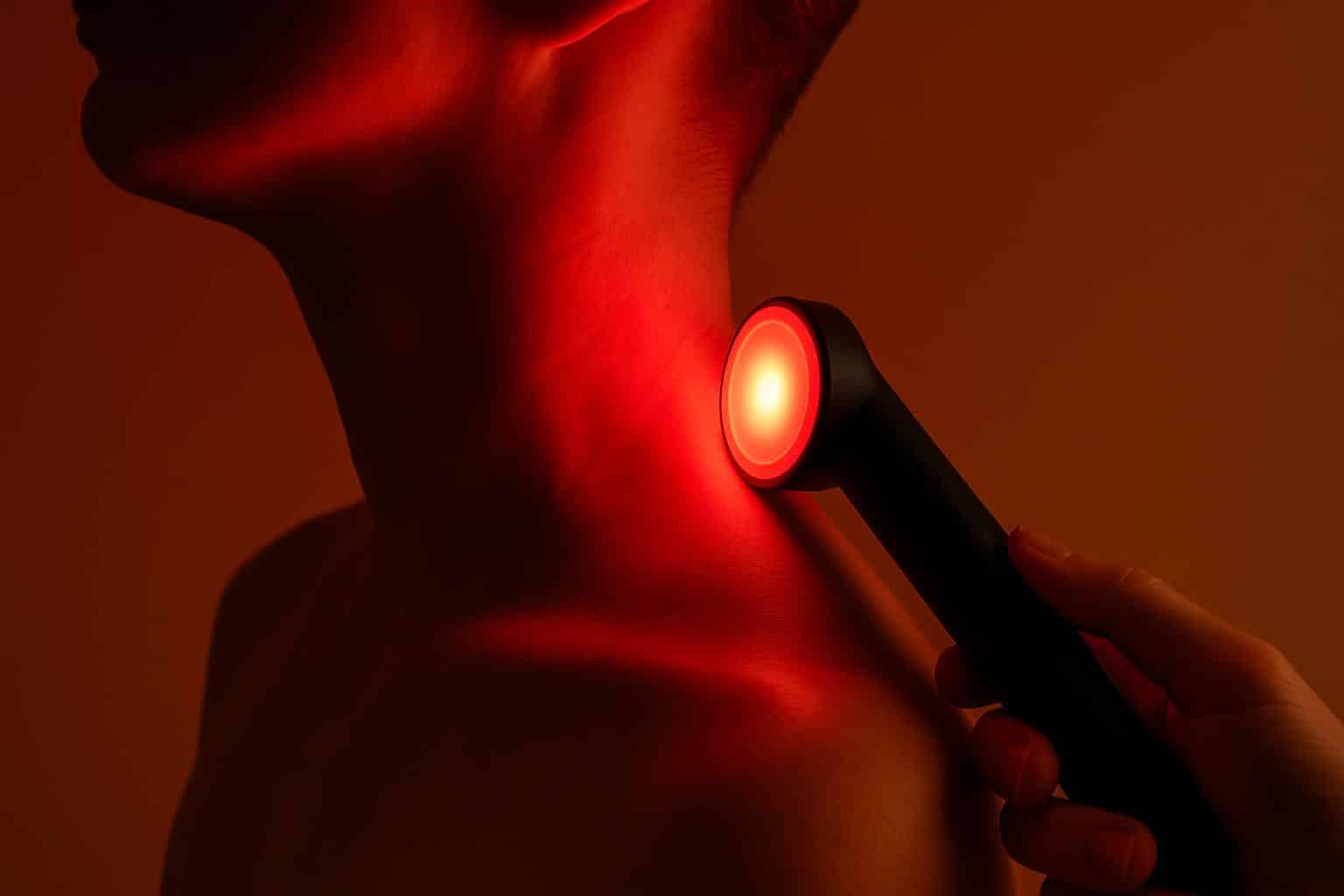 Red light therapy wand applied to neck for 30-day treatment results review
