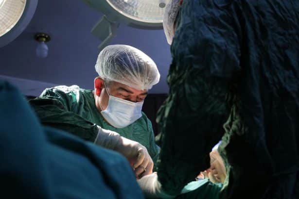Image 1 of 5 Questions Every Healthcare Employer Should Ask Before Launching a Recruitment Campaign https://unsplash.com/photos/a-man-in-a-surgical-gown-and-mask-is-in-the-operating-room-Z2aky_sQPXU