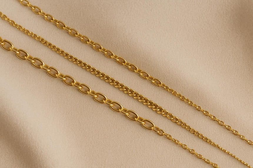 Delicate gold permanent bracelets and anklets displayed on a neutral background for jewelry trends